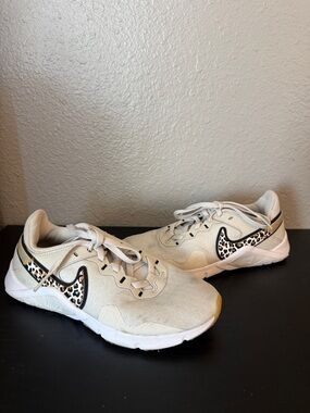 Nike Cream Athletic Sneakers with Leopard Swoosh